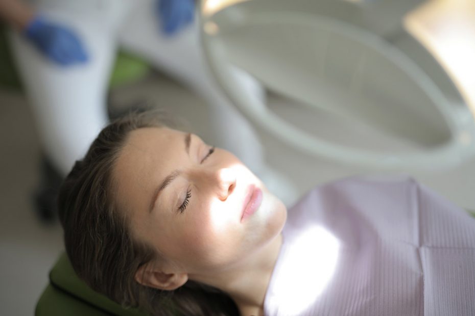 woman lying on chair for radiation therapy